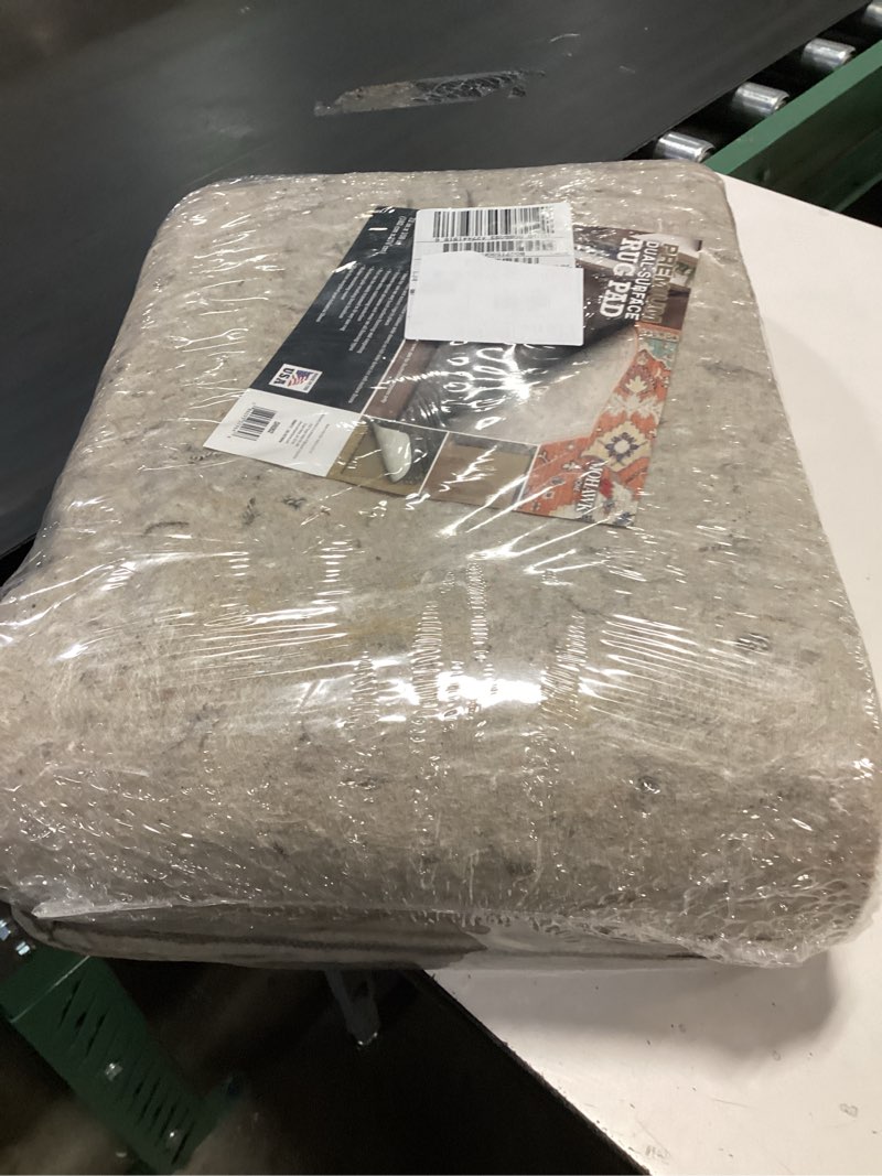 Condition photo showing New/Like New for Mohawk Home 6' x 9' Non Slip Grip Rug Pad 1/4" Thick Dual Surface Felt Cushion + Rubber Gripper - Safe for All Floors 1/4 Inch Dual Surface Rug Pad 6' x 9' (Rectangular)
