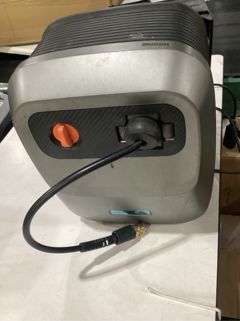 Condition photo showing As Is for giraffe tools grandfalls retractable pressure washer g20b, 2500 psi 2.2 gpm, wall mounted power washer with 65ft hose reel, black pressure hoses, 4 nozzles for floor/cars/fences/patios, dark silver