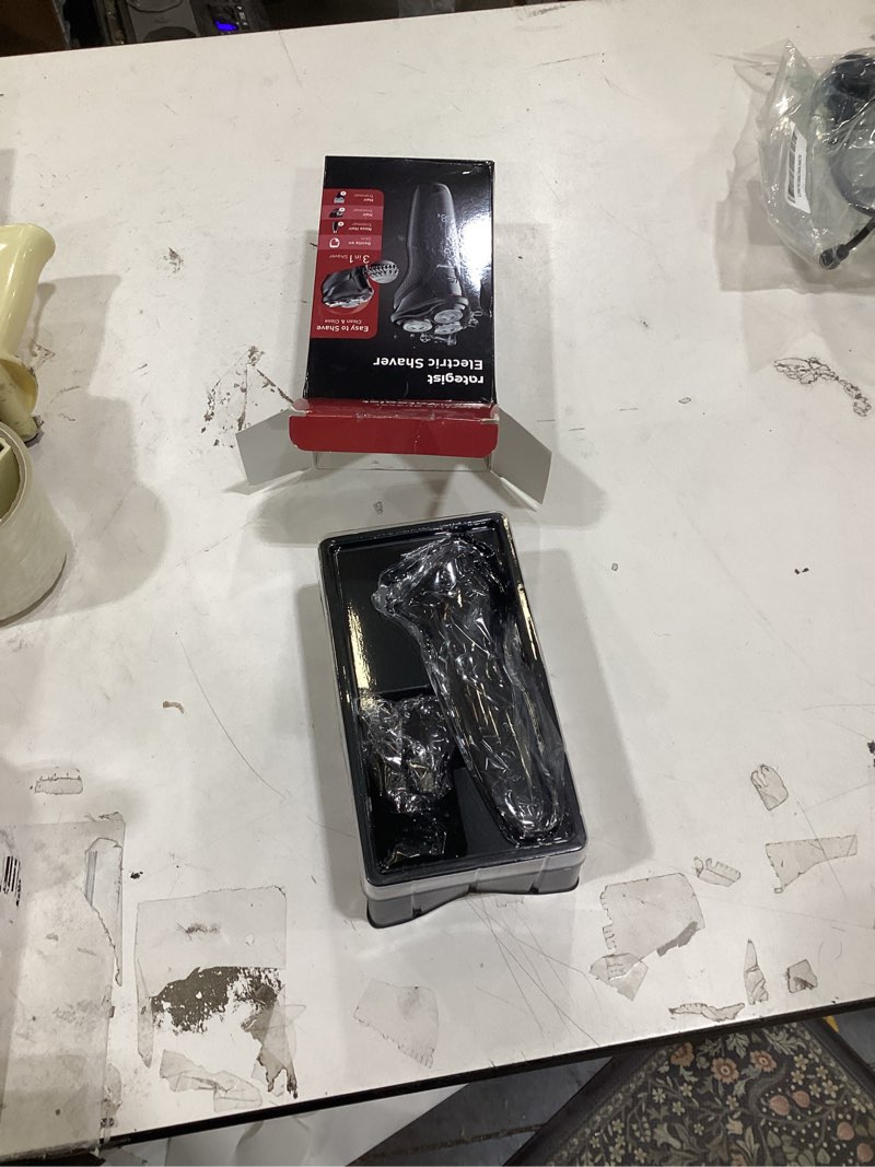 Condition photo showing New/Like New for rategist cordless electric razor for men: 3-in-1 shaver for beard/nose/sideburns - ipx7 waterproof travel kit - turbo speed & precision blades pearlescent black?