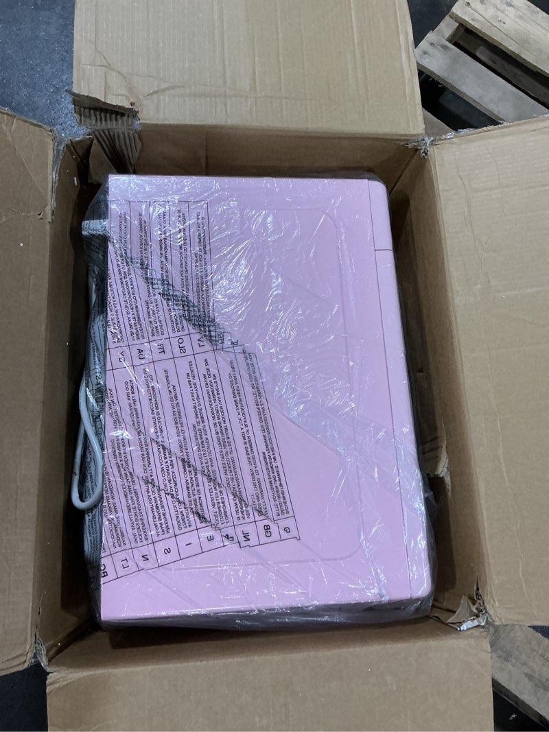 Condition photo showing Good Condition for Nostalgia Retro Countertop Microwave Oven - 1.1 Cu Ft & 1000 Watt Power- Easy to Clean with Removable Glass Turntable - Child Safety Lock - 12 Programs - Digital Clock - Pink Retro Classic 1.1 Cu. Ft. Pink