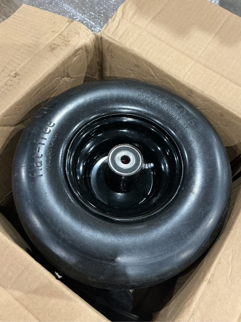 Condition photo showing As Is for antego tire & wheel 2 pack 13x5.00-6 black no flat front solid tire puncture proof assemblies