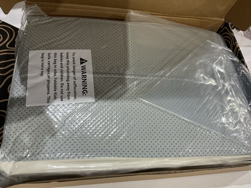 Condition photo showing Good Condition for yacodavo foldable baby changing pad with vegan leather cover, standard side waterproof & wipeable changing pad for toddler, flat foam travel diaper changing pad for dresser and table, white