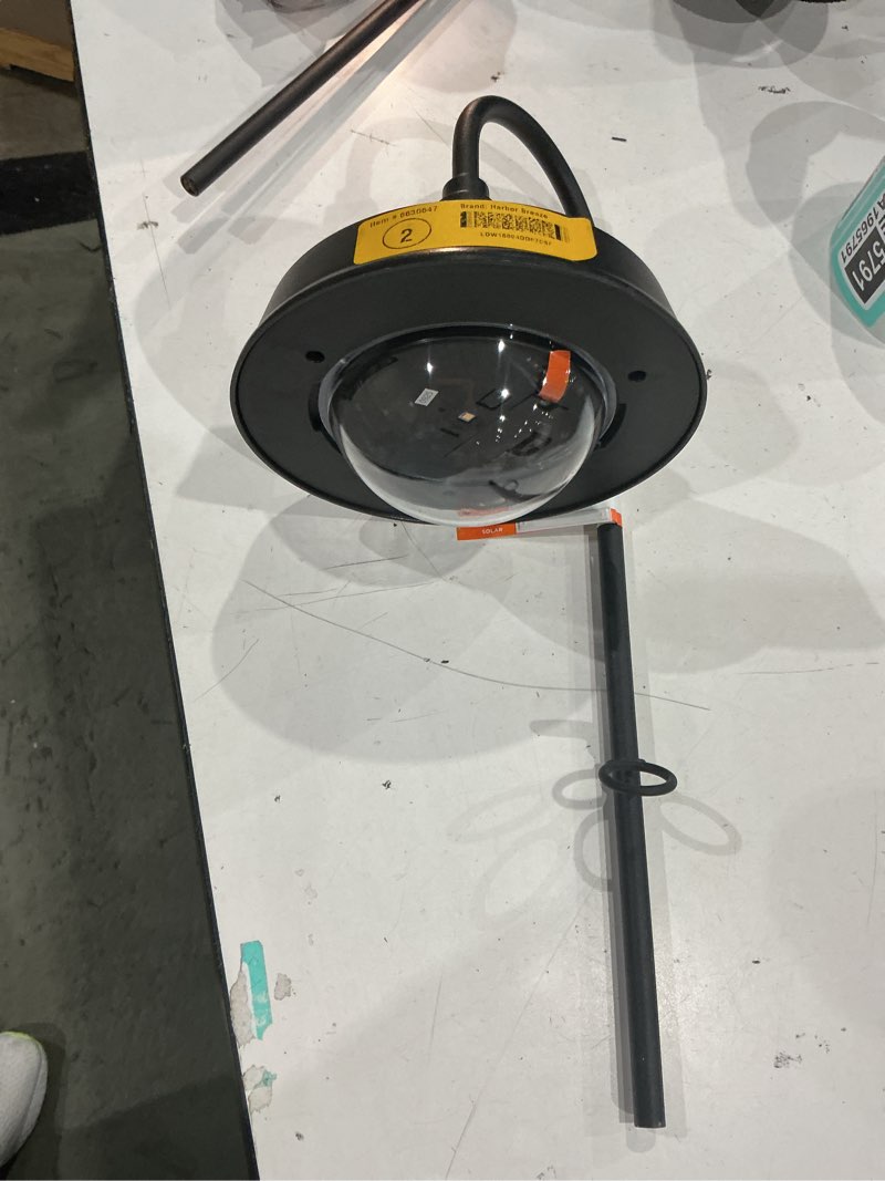 Condition photo showing As Is for harbor breeze farmhouse 20 -lumens black solar led outdoor path light with dusk-to-dawn sensor