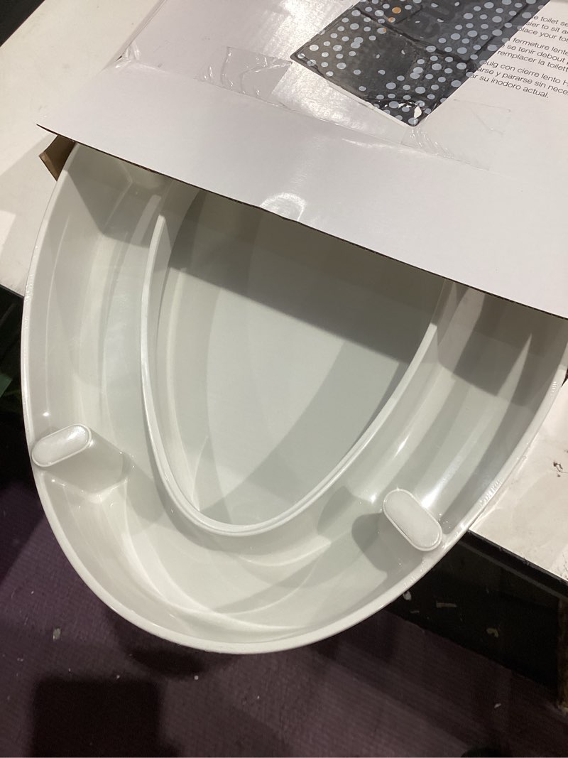 Condition photo showing New/Like New for kohler 25875-0 hyten 3" height, elevated soft close elongated toilet seat, contoured seat with grip-tight bumpers, quick-attach hardware, no slam toilet seat, white white elongated
