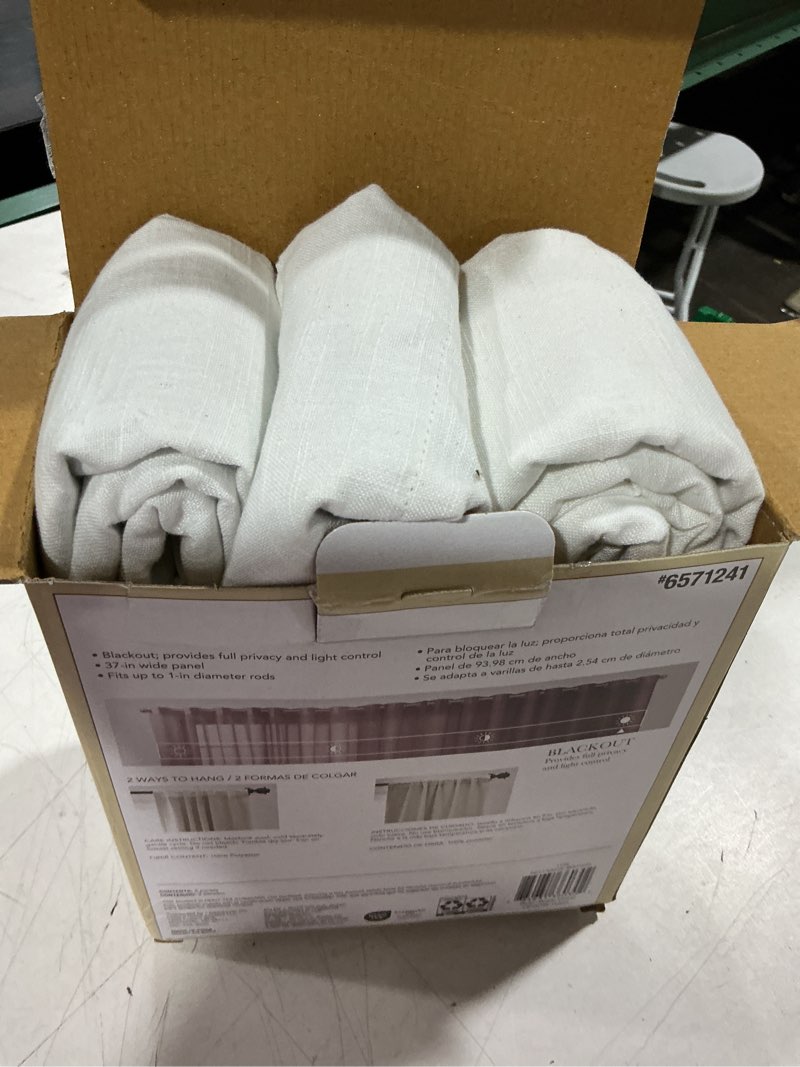 Condition photo showing As Is for allen + roth 84-in ivory blackout interlined back tab curtain panel pair