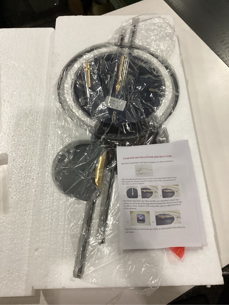 Condition photo showing New/Like New for Modern Wall Clock for Living Room,Large Black Decorative Wall Clock with Light,Creative Silent Clock Battery Operated Metal Wall Art for Entryway/Bedroom/Office/Dinning Room/Kitchen Decor 11"W x 26"H