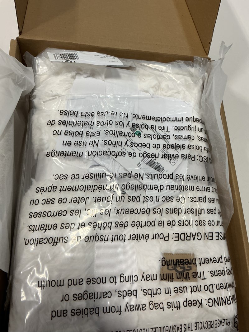 Condition photo showing Good Condition for UGG Adalee Faux Fur Throw Blanket Luxury Lightweight Cozy Soft Throw for Couch Bed or Chair Hypoallergenic Machine Washable Double-Sided Fluffy Blanket Home Decor, 50-inch x 70-inch, Natural White White Throw