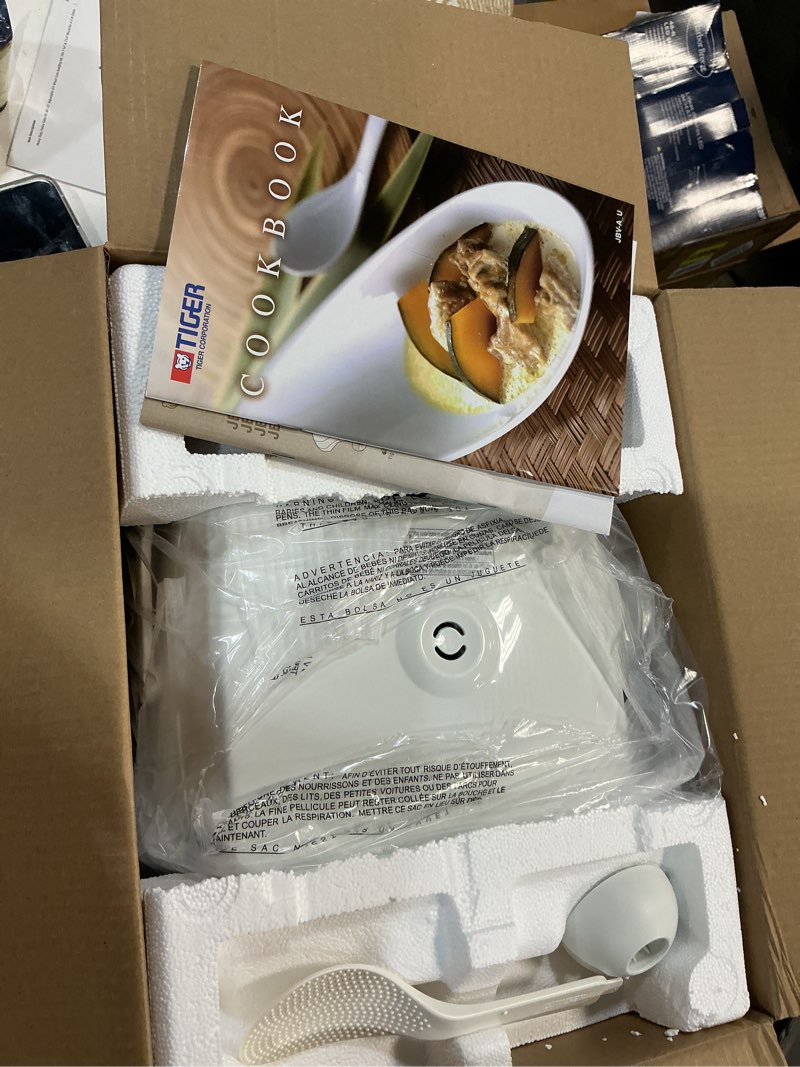 Condition photo showing New/Like New for tiger jbv-a18u-w 10-cup (uncooked) micom rice cooker with food steamer & slow cooker, white