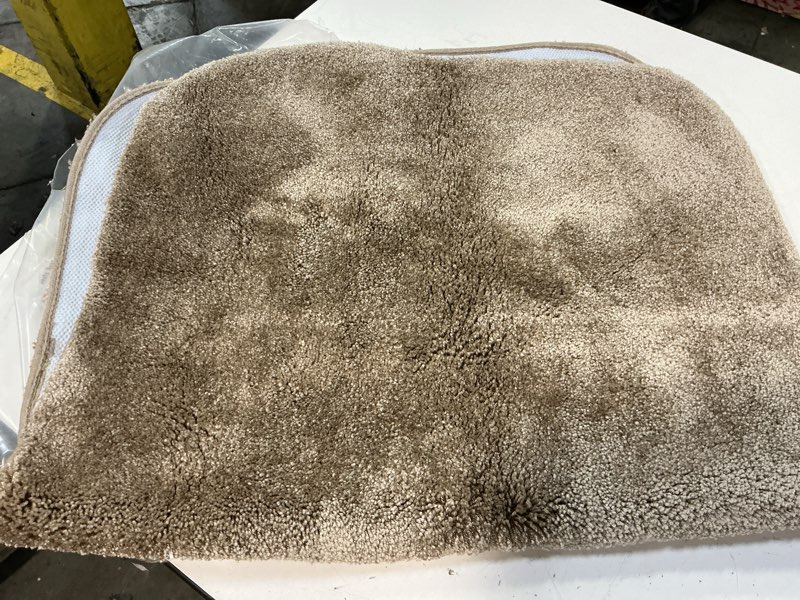 Condition photo showing Good Condition for OLANLY Bathroom Rugs 36x24, Extra Soft Absorbent Chenille Bath Rugs, Rubber Backing Quick Dry, Machine Washable Bath Mats for Bathroom Floor, Tub and Shower, Home Decor Accessories, Tan Tan 36" x 24"