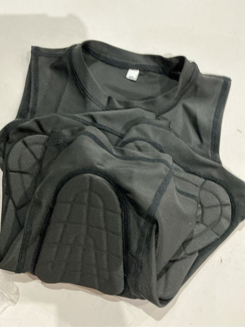 Condition photo showing Good Condition for football rib protector vest for youth kids, lacrosse padded comression shirts for boys & girls