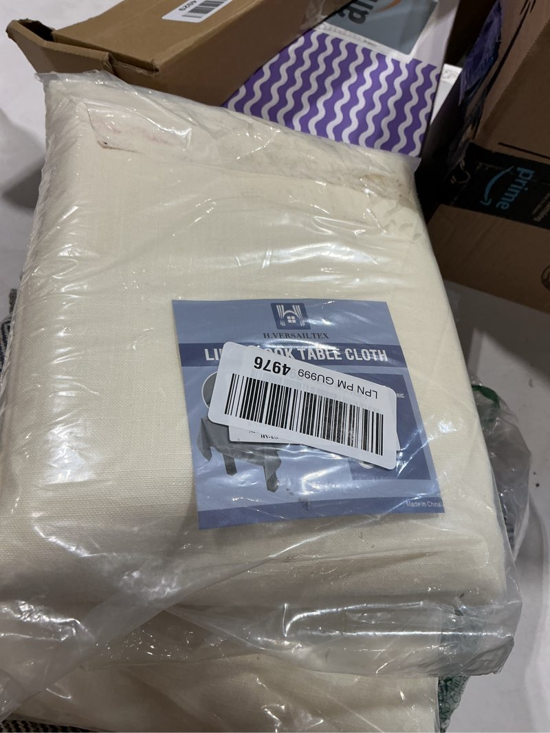 Condition photo showing New/Like New for similiar product h.versailtex linen textured table cloths rectangle 60 x 120 inch premium solid tablecloth spill-proof waterproof table cover for dining buffet feature extra soft and thick fabric wrinkle free, ivory 120\" x 60\" (rectangular) ivory
