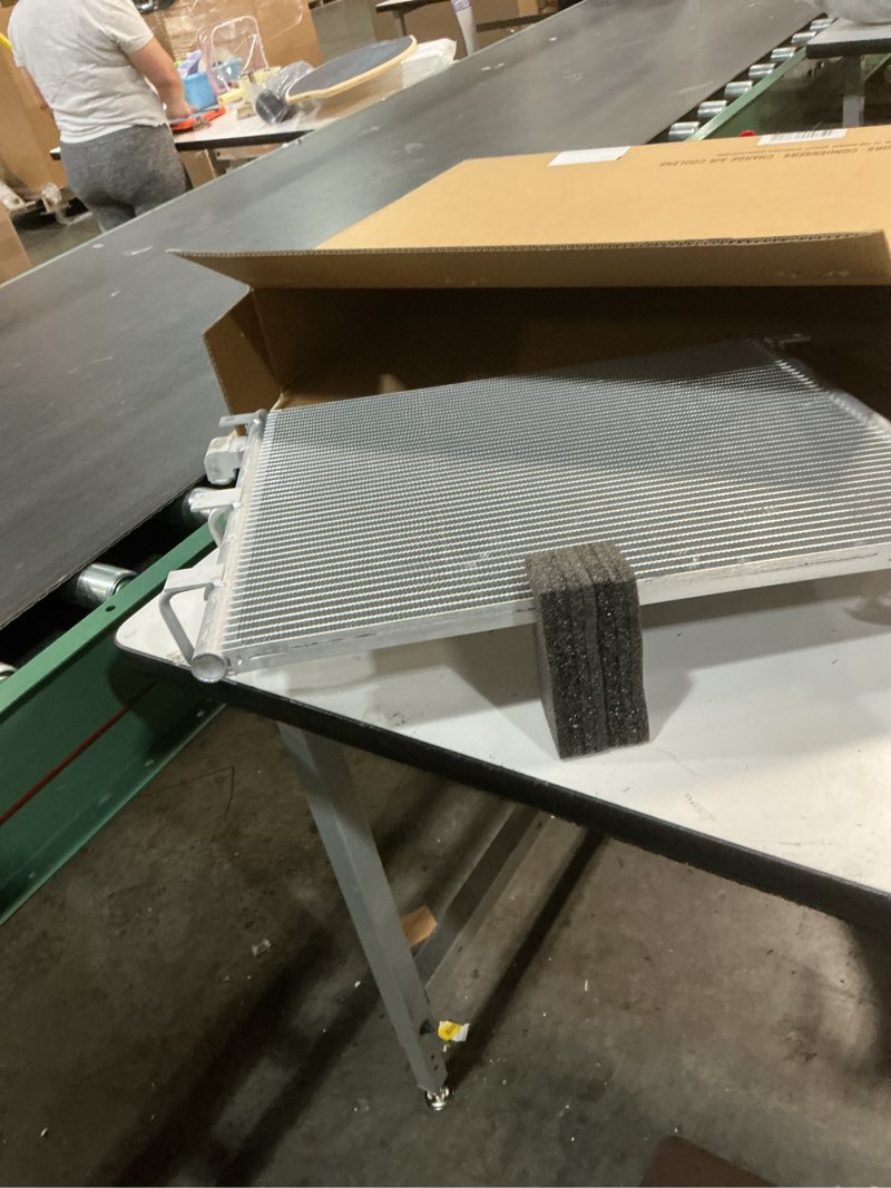 Condition photo showing New/Like New for ((Similar))TRQ A/C Condenser Assembly Direct Fit for Cadillac Chevy GMC New ACA14723 Fits select: 2017-2021 GMC ACADIA, 2017-2020 CADILLAC XT5