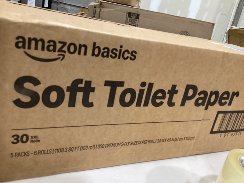 Condition photo showing New/Like New for amazon basic toilet paper
