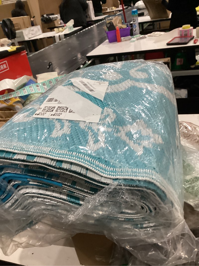 Condition photo showing Good Condition for Pauwer Waterproof Outdoor Rug 5x8, Reversible Plastic Straw Patio Camping Rug, Indoor Outdoor RV Mat Carpet for Deck, Camper, Porch, Balcony, Backyard, Picnic, Boho Teal 5' x 8' (Rectangular) Boho Teal