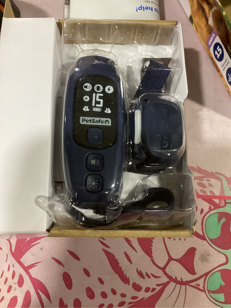 Condition photo showing As Is for petsafe core dog trainer with remote 1000 ft. receiver collar