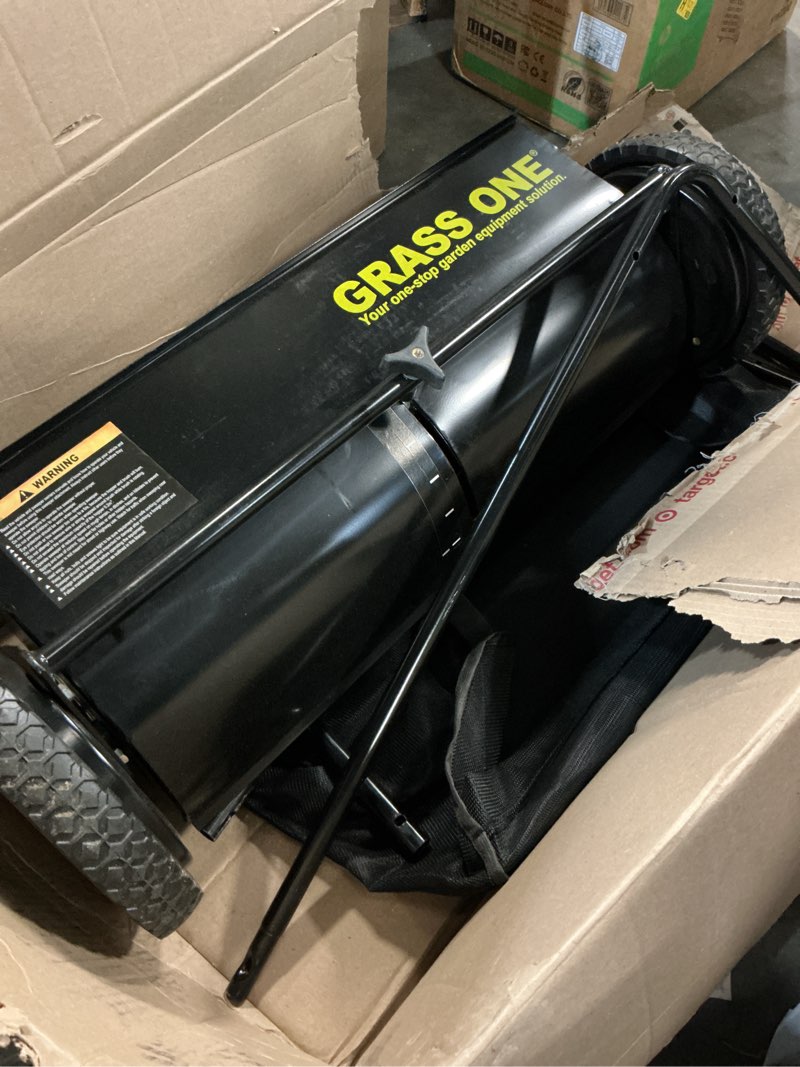Condition photo showing Good Condition for push lawn sweeper, 26-inch width, 7 cu. ft. hopper capacity, 4 spinning brushes, adjustable height, durable steel frame with rubber wheels, ideal for leaves and grass