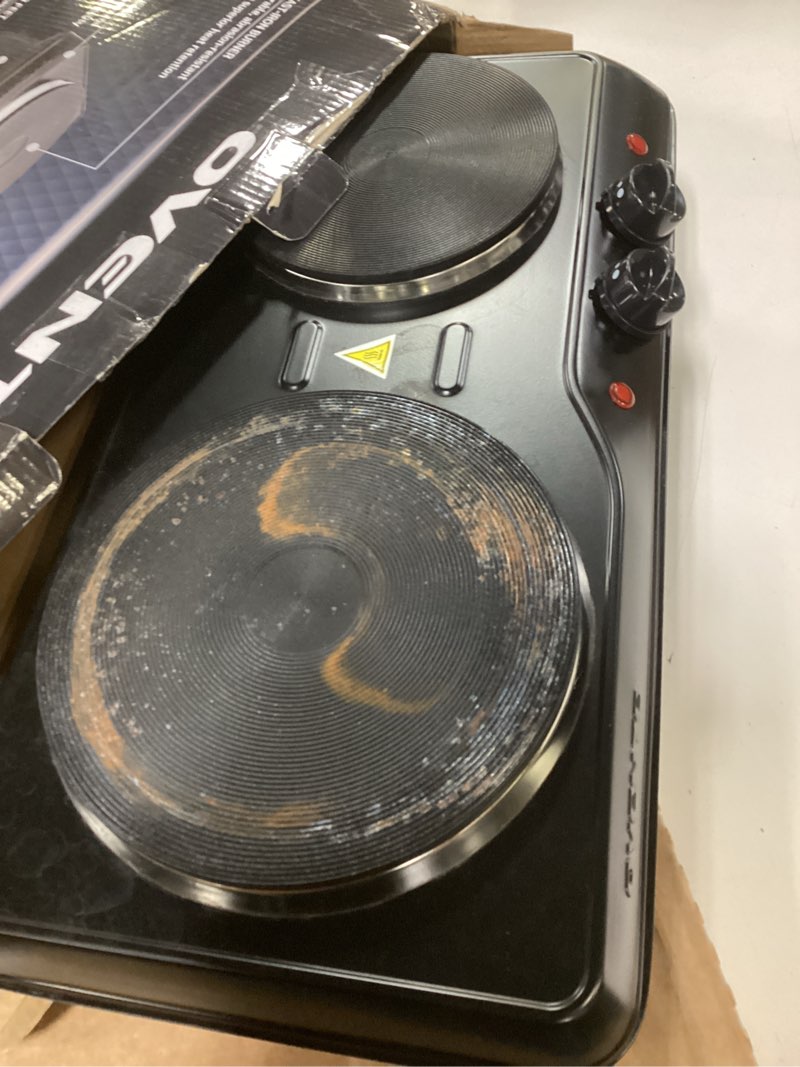 Condition photo showing As Is for OVENTE Electric Countertop Double Burner, 1700W Cooktop with 7.25" and 6.10" Cast Iron Hot Plates, Temperature Control, Portable Cooking Stove and Easy to Clean Stainless Steel Base, Black BGS102B