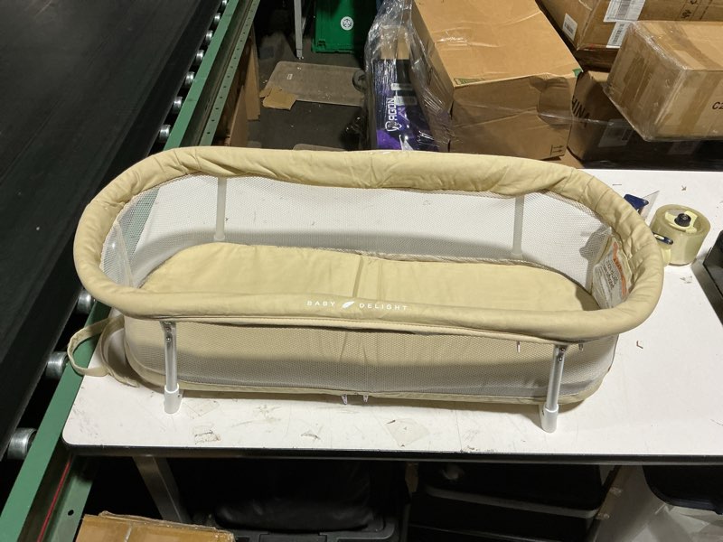 Condition photo showing Good Condition for baby delight snuggle nest bassinet for 0-5 months, portable baby bed with machine washable sheet