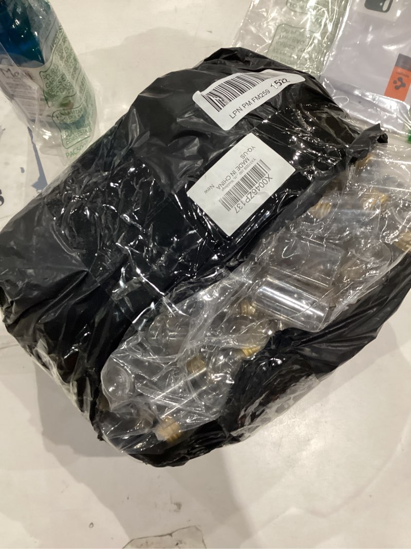 Condition photo showing As Is for 100 shot bottles 