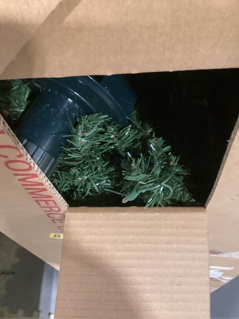 Condition photo showing As Is for National Tree Company 7 ft Pre-Lit Downswept Douglas Fir Artificial Christmas Tree, 700 Clear Lights, 1,539 Tips, Includes Stand, Green 7ft Christmas Tree