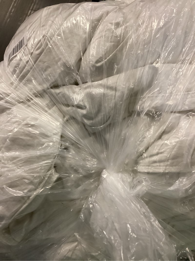 Condition photo showing New/Like New for premium down comforter, king/cal king, down