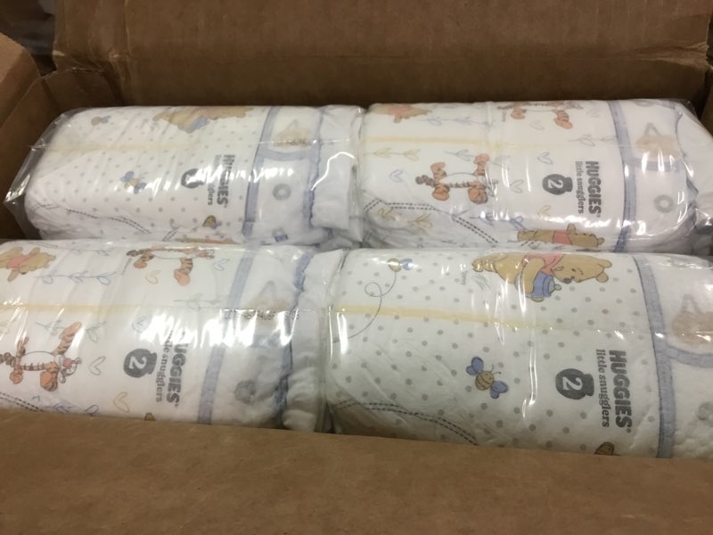 Condition photo showing Good Condition for Huggies Size 2 Diapers, Little Snugglers Baby Diapers, Size 2 (12-18 lbs), 148 Count, Packaging May Vary Size 2 148