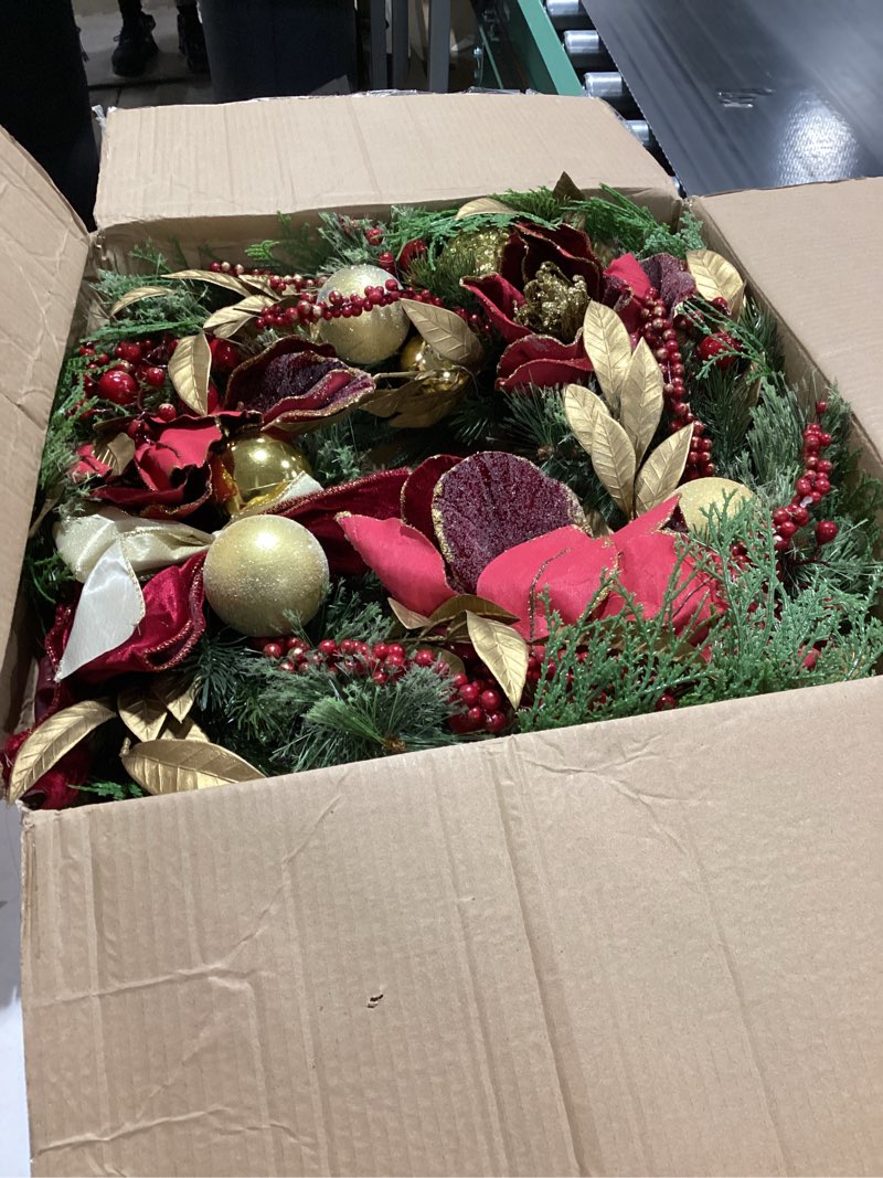 Condition photo showing As Is for 24" Christmas Wreaths for Front Door with Red Magnolia Artificial & Berries, Christmas Door Wreath with Bow Gold Balls Pine Needles for Home Wall Window Indoor Outdoor Xmas Decorations & Holiday Decor Red Gold