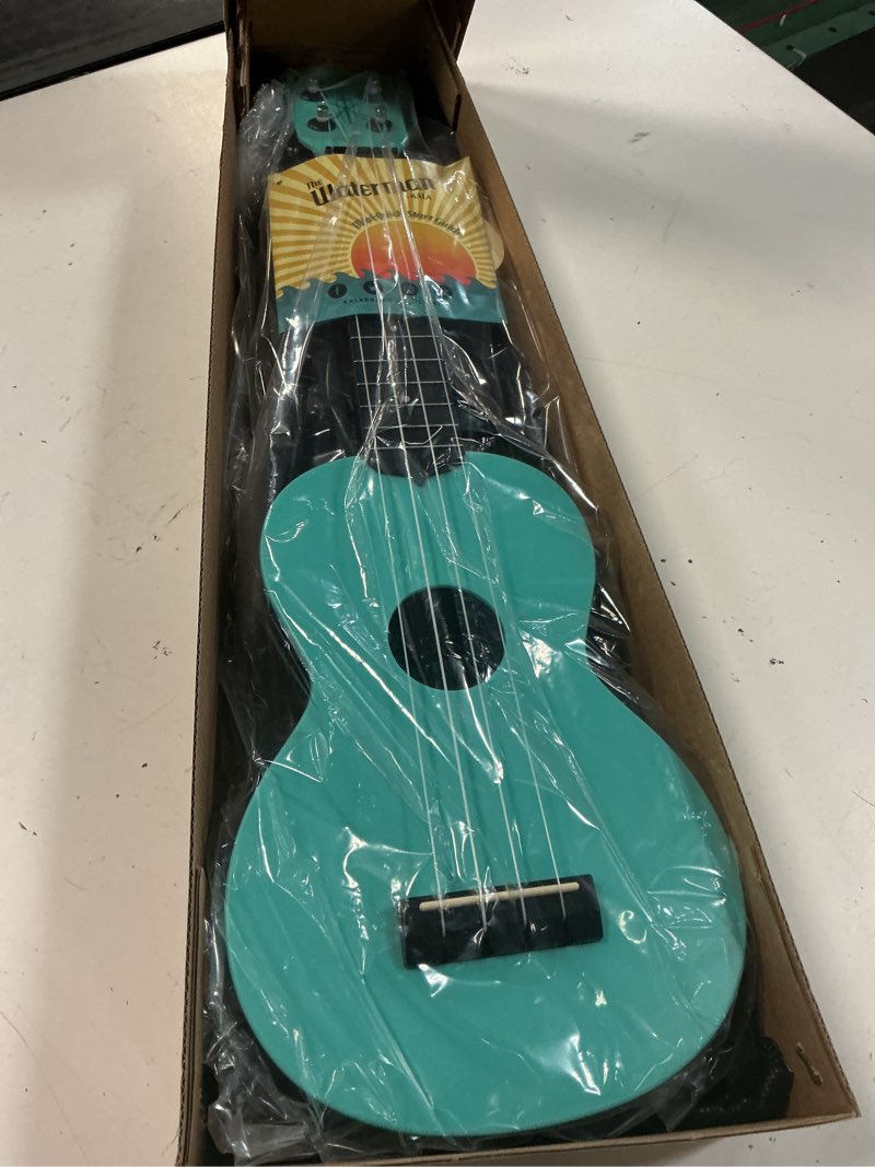 Condition photo showing New/Like New for kala waterman glow-in-the-dark matte soprano ukulele (aqua)