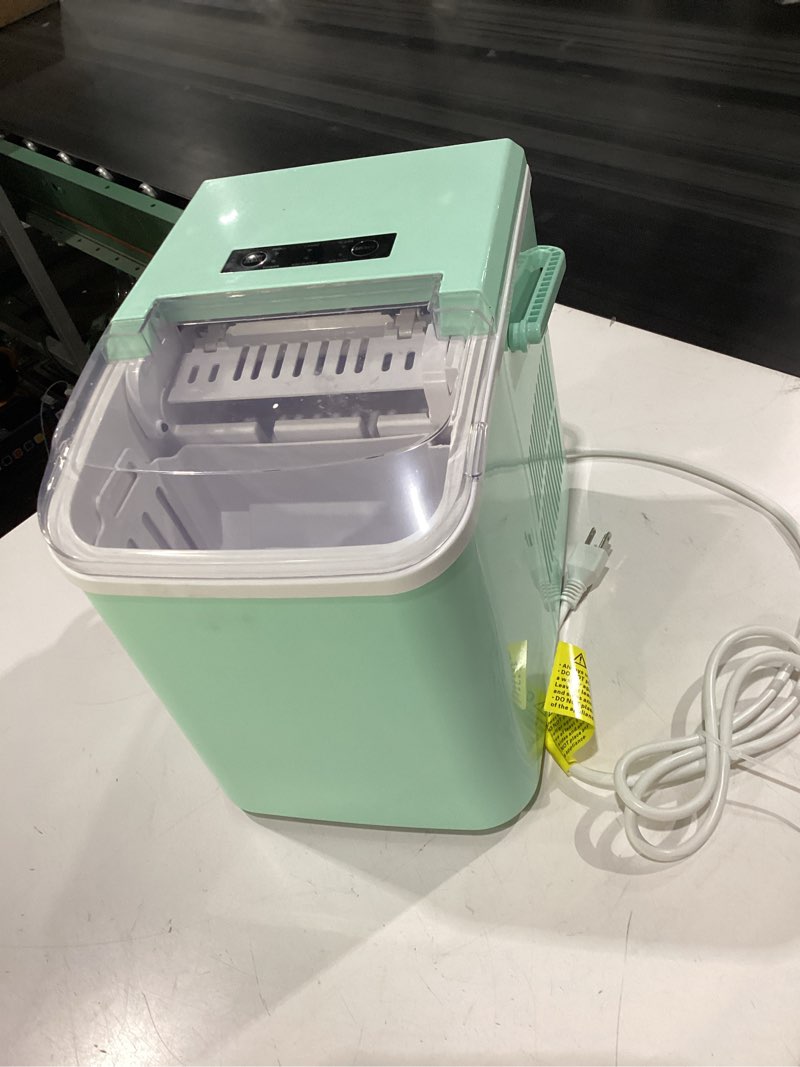 Condition photo showing As Is for **not tested**  olixis ice maker machine with handle,26lbs in 24hrs,9 ice cubes in 6 mins,auto-cleaning portable ice maker with basket and scoop, countertop ice maker for home/kitchen/camping/rv, sleek green sleek green handle-26.5lbs/24h
