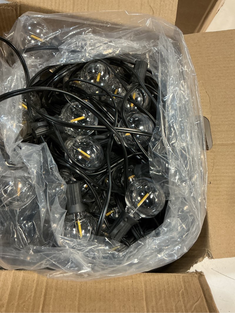 Condition photo showing Good Condition for 100ft outdoor string lights waterproof/connectable/dimmable with 62 led shatterproof bulbs ul listed, g40 globe 2700k patio lights outdoor lighting for backyard porch cafe party wedding garden 100ft 60+2bulbs