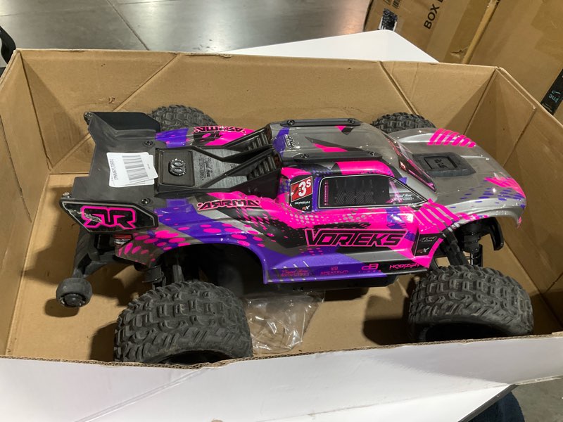 Condition photo showing As Is for arrma rc truck 1/10 vorteks 4x4 223s blx brushless stadium truck rtr (battery and charger not included) with dsc, purple, ara4305v4t3