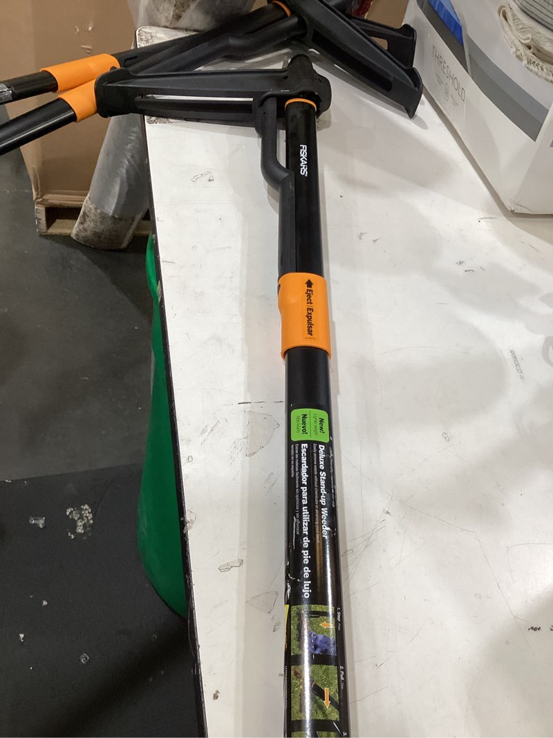 Condition photo showing As Is for fiskars 39.25 in. stainless steel weeder aluminum handle