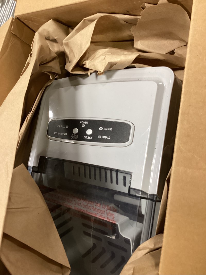 Condition photo showing As Is for frigidaire 26 lbs per day portable compact maker, ice making machine, stainless, medium