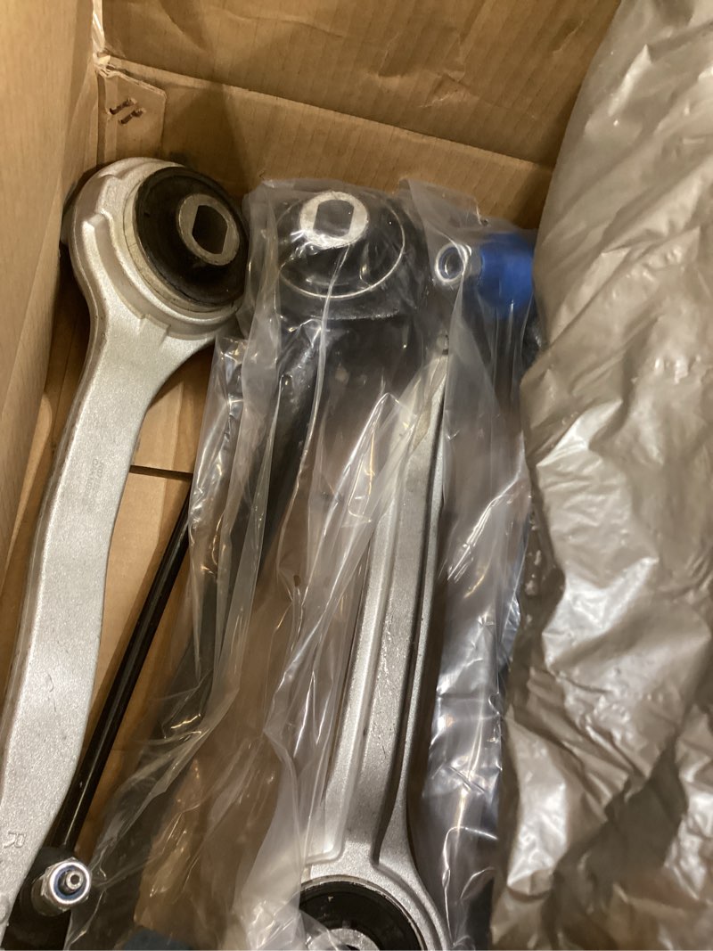Condition photo showing As Is for trq front forward lower driver and passenger side control arm and ball joint set 2 piece compatible with 17-23 tesla model 3 psa43385