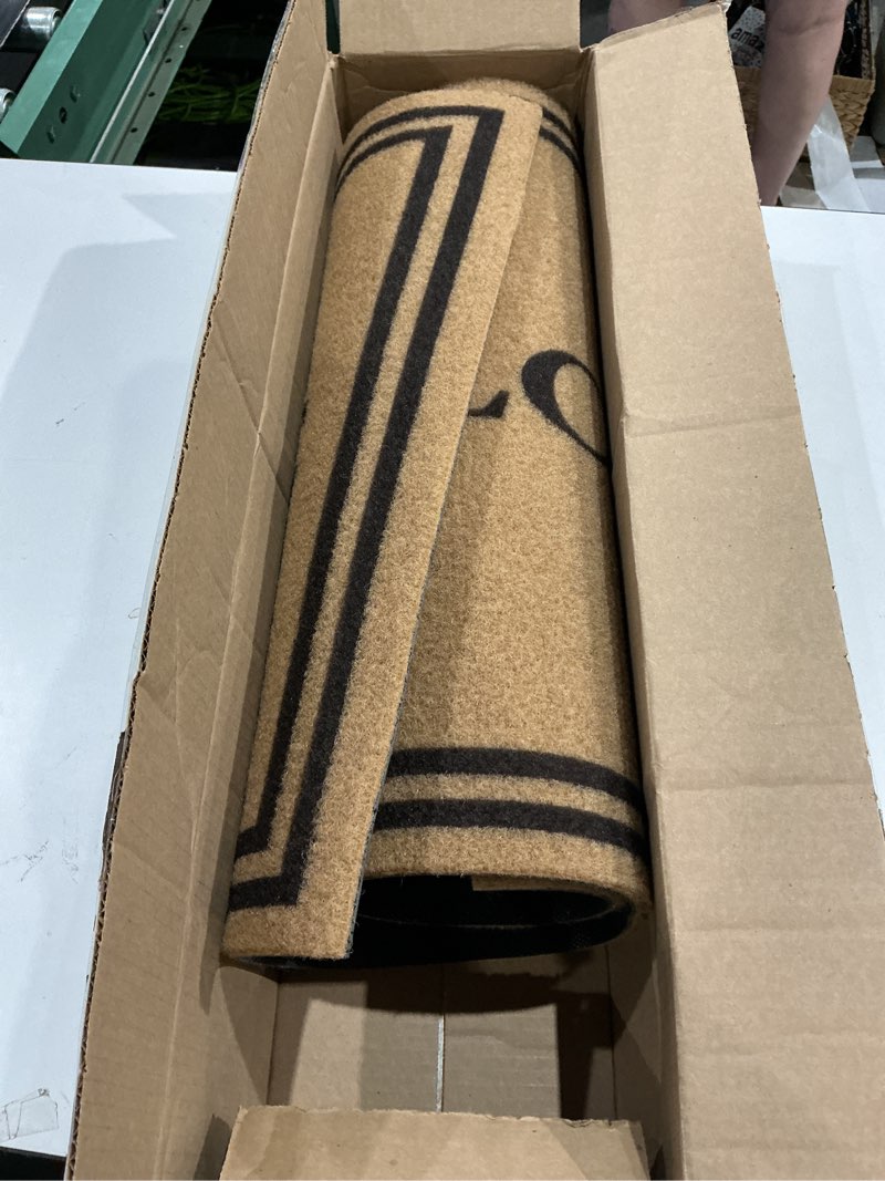 Condition photo showing As Is for olanly front door mat, low profile doormat, stain and fade resistant, easy to clean, for indoor and outdoor entrances, patio porch or entryway, brown (35x23 inch, welcome) brown welcome rectangular 35" x 23"