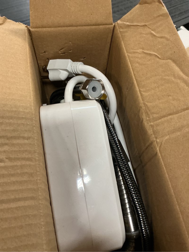Condition photo showing As Is for novashion instant 110 volts 3500 watts water heater for bathroom