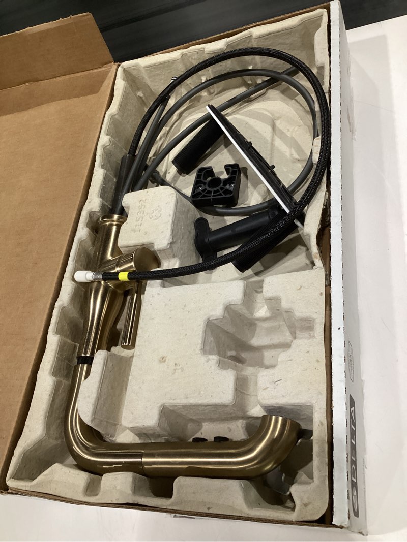 Condition photo showing As Is for Delta Almari Brushed Gold Kitchen Faucet with Pull-Out Sprayer, Modern Single Hole Kitchen Sink Faucet, Single Handle, Champagne Bronze 16943-CZ-DST