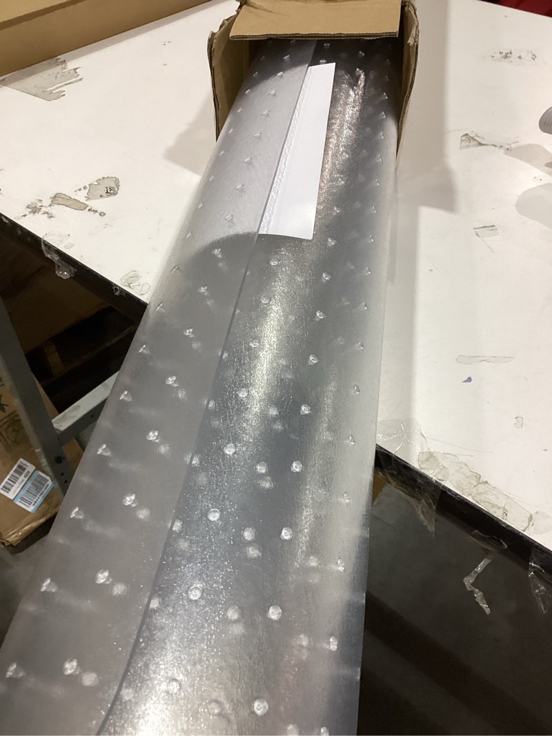 Condition photo showing New/Like New for Amazon Basics Office Chair Mat for Low Pile Carpeted Floors with Lip, 36" x 48", Clear 36” x 48” with Lip