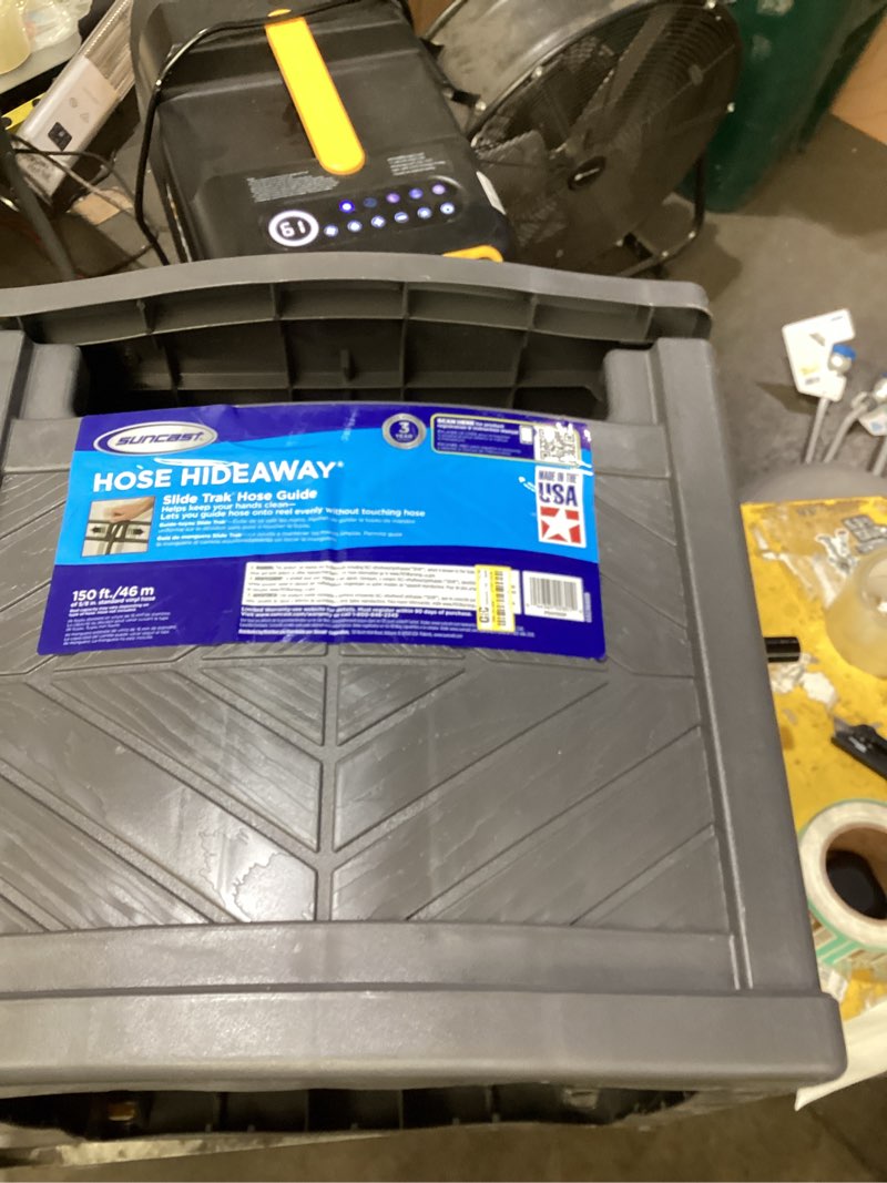 Condition photo showing As Is for suncast 150 ft. gray free standing hideaway hose reel