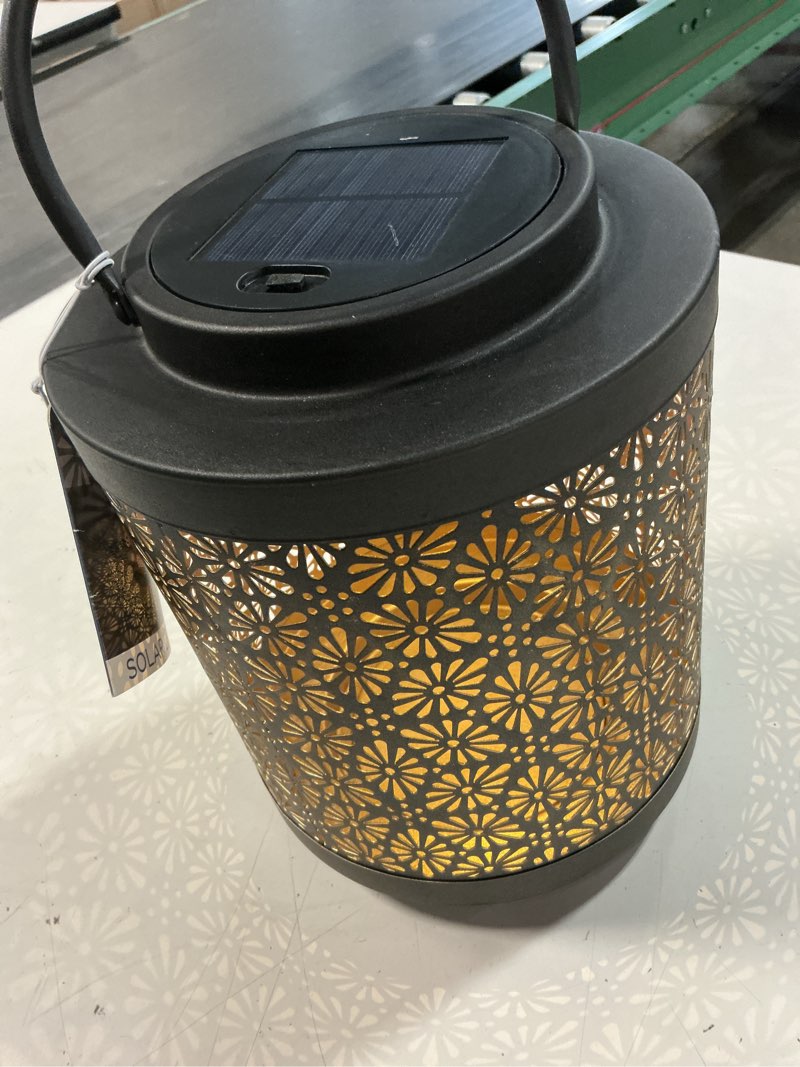 Condition photo showing Good Condition for style selections 8-in x 14.96-in black metal solar outdoor decorative lantern