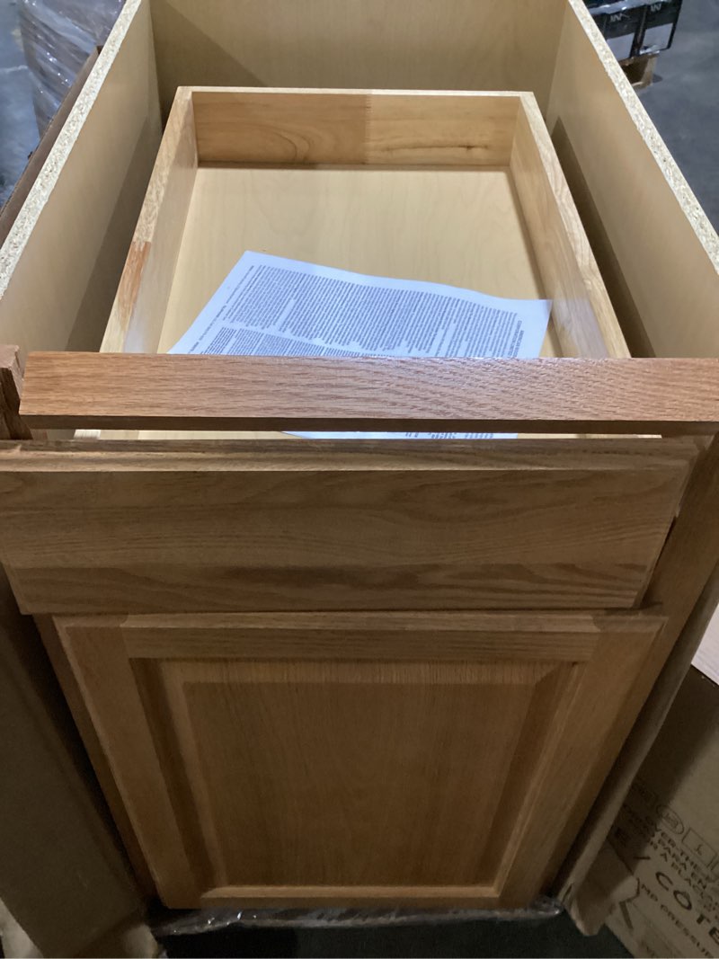 Condition photo showing As Is for hampton 18 in. w x 24 in. d x 34.5 in. h assembled double trash can base kitchen cabinet in natural hickory