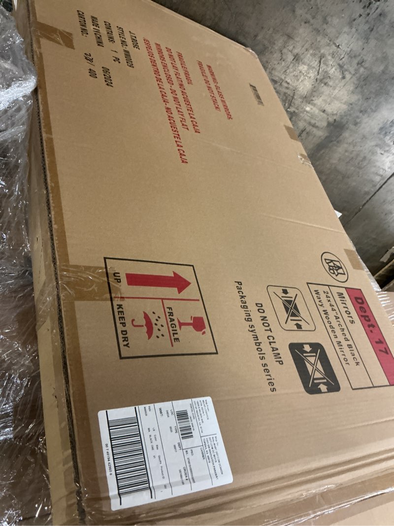 Condition photo showing New/Like New for 24 x 44" arched black wavy wood frame mirror