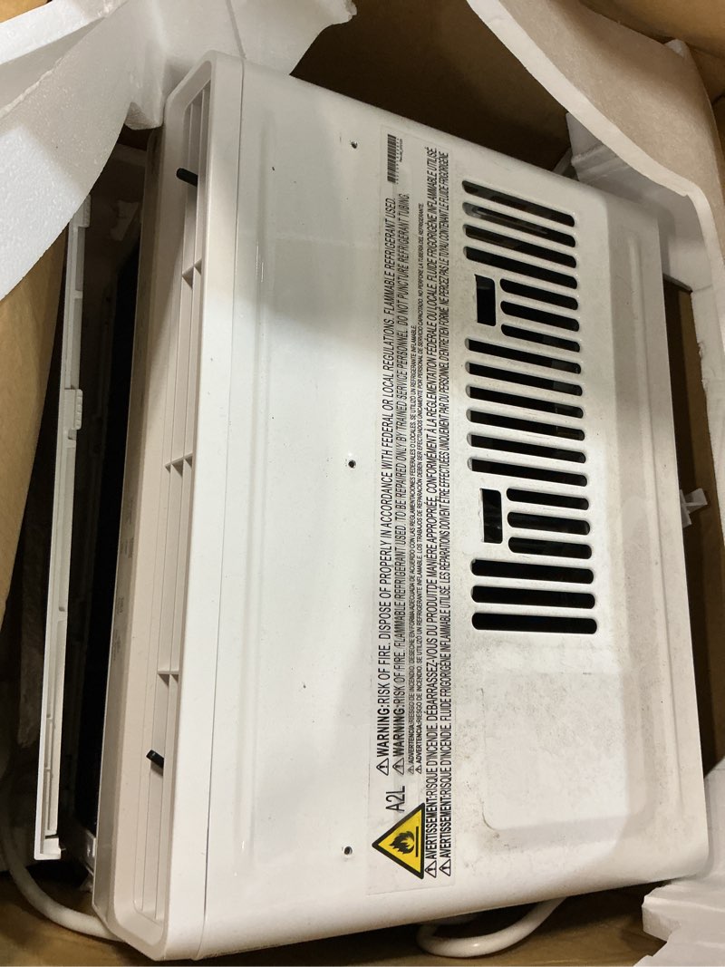 Condition photo showing As Is for lg 5000 btu window air conditioner with remote, easy button control ultra-quiet compact-size cools 150 sq.ft. for small room, washable filter ac unit easy installation white lw5025r