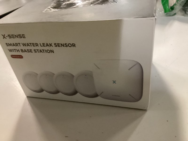 Condition photo showing New/Like New for X-Sense Wi-Fi Water Leak Detector Kit, Smart Water Sensor Alarm with App Alerts and Ultra-Slim Design, Water Alarm Leak Detector for Basements, 4 Water Sensors and 1 Base Station, Model SWS0A41 4 Sensors (0 dB) + Base Station