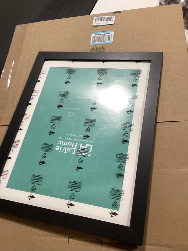 Condition photo showing Good Condition for lavie home 14x18 picture frame black poster frame,display pictures 12x16 with mat or 14x18 without mat, stable and sturdy frame and polished plexiglass, horizontal and vertical format of the walls 14x18 black