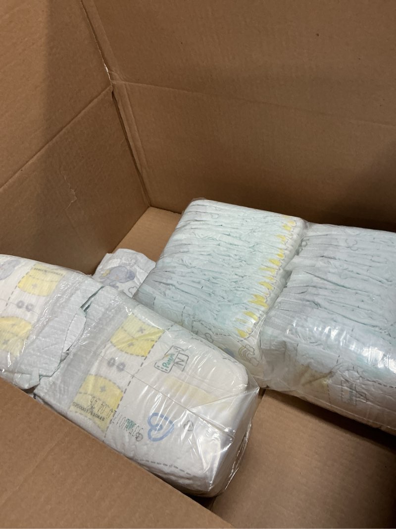 Condition photo showing As Is for Pampers Swaddlers Diapers, Size 0 (up to 10 lbs), 84 Count, Absorbent, Keeps Baby Dry and Comfortable, Skin Safe Disposable Baby Diaper (Packaging May Vary) Newborn 84