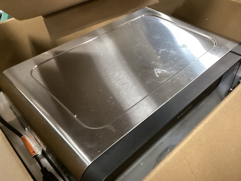 Condition photo showing As Is for instant pot no preheat required* 6-in-1 pizza and toaster oven with instantheat technology, fits a 12" fresh or frozen pizza, bake, toast, broil, & reheat