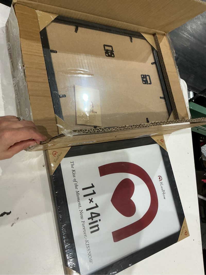 Condition photo showing Good Condition for set five 11x14inch black- framed pictures, kiss now brand 