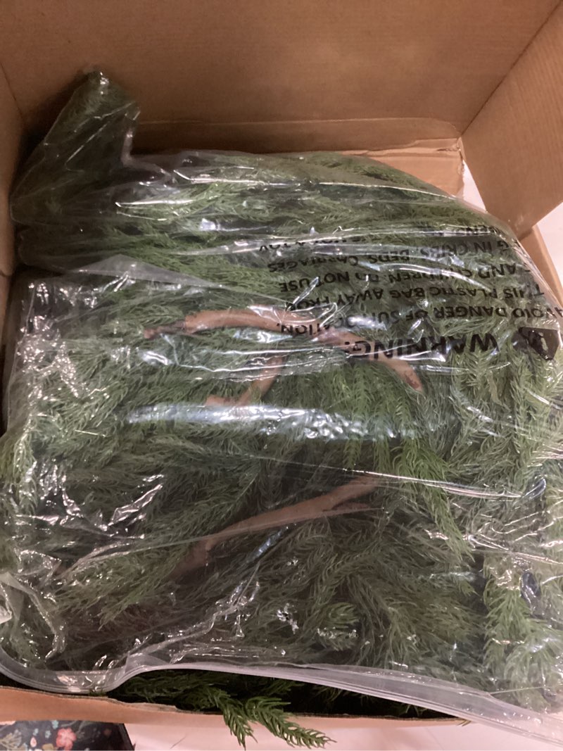 Condition photo showing Good Condition for 16FT Real Touch Norfolk Pine Garland - Artificial Christmas Garland Fake Green Faux Pine Needles Garland for Table Fireplace Mantle Holiday Home Indoor Outdoor Decor (1PCS)