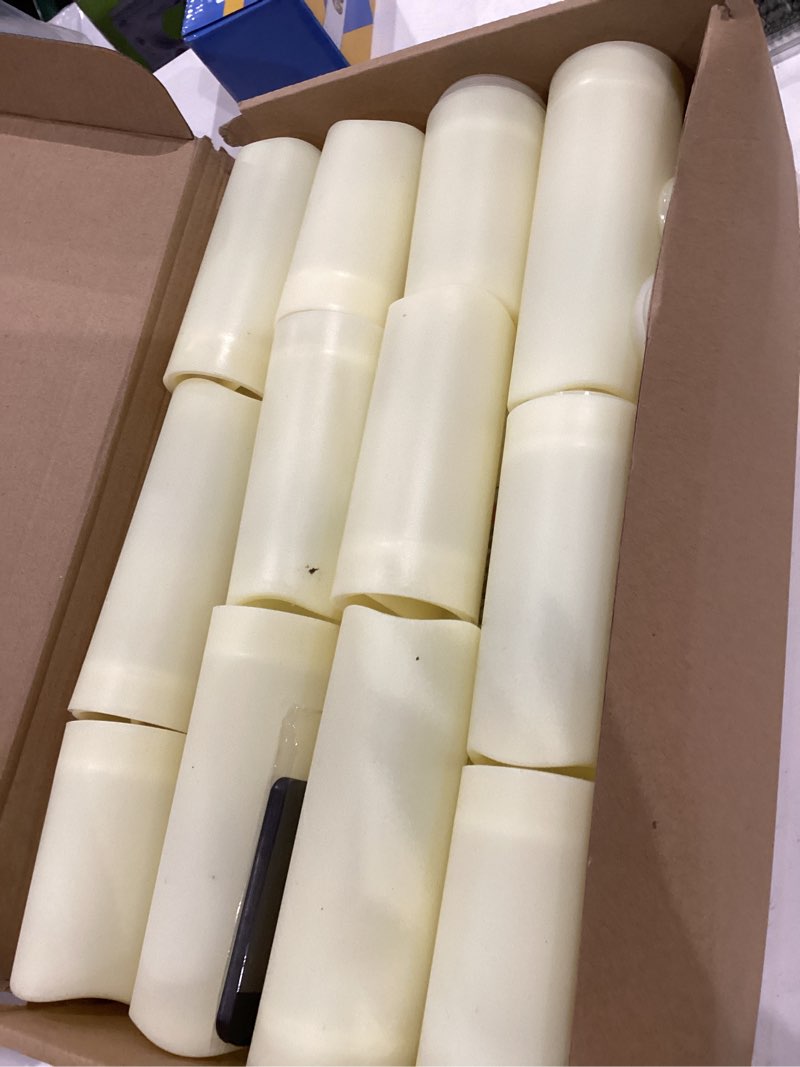 Condition photo showing Good Condition for yoroxrg set of 24 waterproof outdoor flameless candles, led candles with 4 remote and timer,(h 4" 5" 6" x d 2.2"),for halloween wedding festiv 24pack-ivory